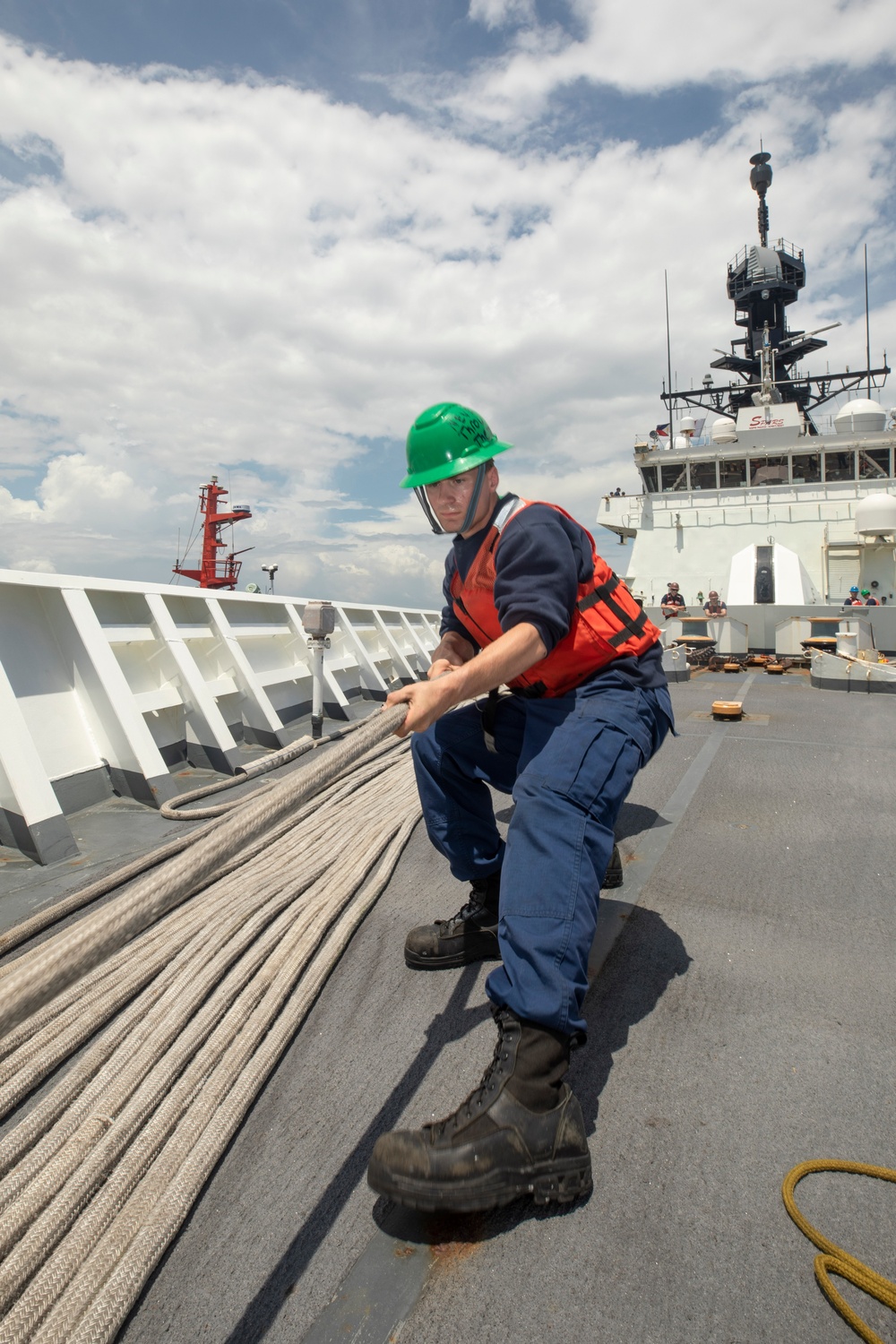 Sailor Heaves Mooring Line Aboard U.S. Coast Guard Cutter Stratton