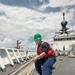 Sailor Heaves Mooring Line Aboard U.S. Coast Guard Cutter Stratton