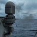 USS Rafael Peralta (DDG 115) fires a Mk 38 25mm machine gun during a live fire exercise