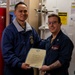 USS Rafael Peralta (DDG 115) conducts a reenlistment on the messdecks