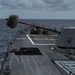 USS Rafael Peralta (DDG 115) fires a Mark 45 5-inch gun during a live fire exercise