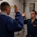 USS Rafael Peralta (DDG 115) conducts a reenlistment on the messdecks