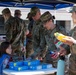 Local Girl Scouts tour 142nd Wing, donate cookies to Guardsmen