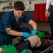 USS Ronald Reagan (CVN 76) sailors simulate a Mass Casualty