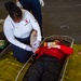 USS Ronald Reagan (CVN 76) sailors simulate a Mass Casualty