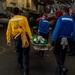 USS Ronald Reagan (CVN 76) sailors simulate a Mass Casualty