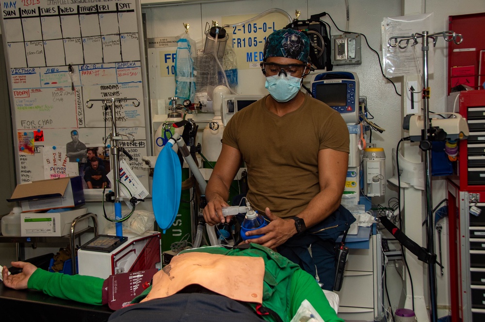 USS Ronald Reagan (CVN 76) sailors simulate a Mass Casualty