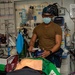 USS Ronald Reagan (CVN 76) sailors simulate a Mass Casualty