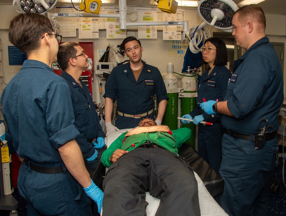 USS Ronald Reagan (CVN 76) sailors simulate a Mass Casualty