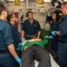 USS Ronald Reagan (CVN 76) sailors simulate a Mass Casualty