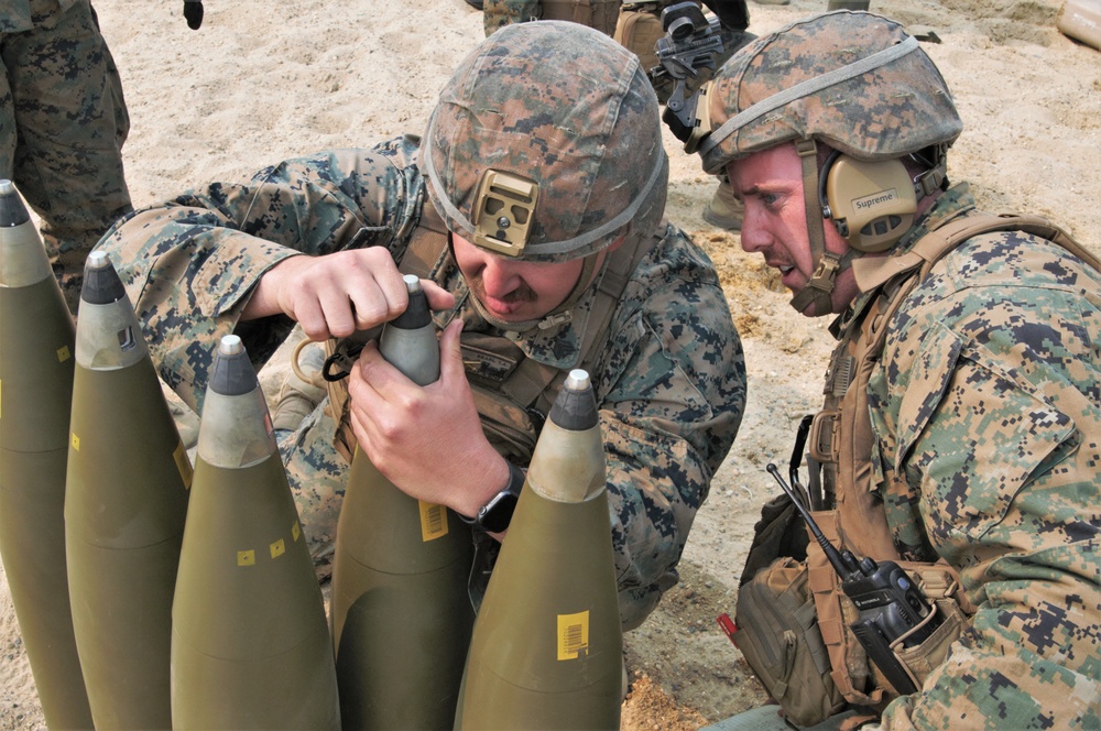 Fort Dix, NJ- The 3 BN 14 Marines conduct live fire artillery exercises.