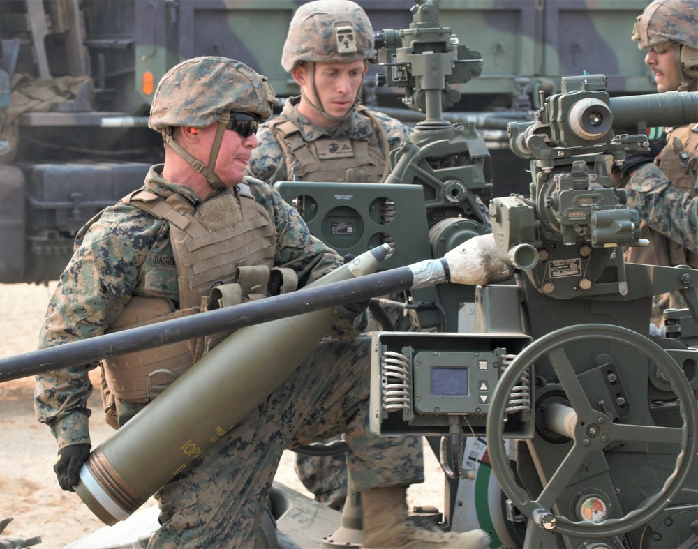 Fort Dix, NJ- The 3 BN 14 Marines conduct live fire artillery exercises.