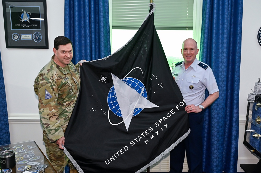 CSO Saltzman receives an original USSF flag