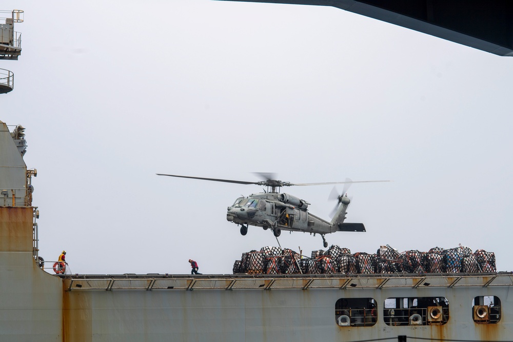 An MH-60S Sea Hawk helicopter Huals Cargo