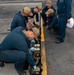 Sailors preform maintenance on the flight deck aboard USS Carl Vinson (CVN 70)