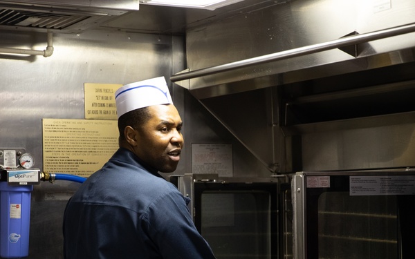 USS Harpers Ferry (LSD 49) Chiefs Mess cooks dinner for the crew