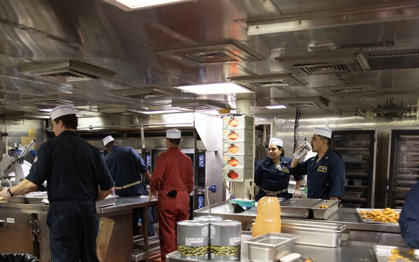 USS Harpers Ferry (LSD 49) Chiefs Mess cooks dinner for the crew