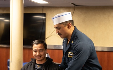 USS Harpers Ferry (LSD 49) Chiefs Mess cooks dinner for the crew