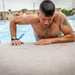 Army Reserve Staff Sgt. James Lavoie climbs an obstacle