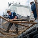 USS Robert Smalls (CG 62) Sailor Makes Preparations for RAS