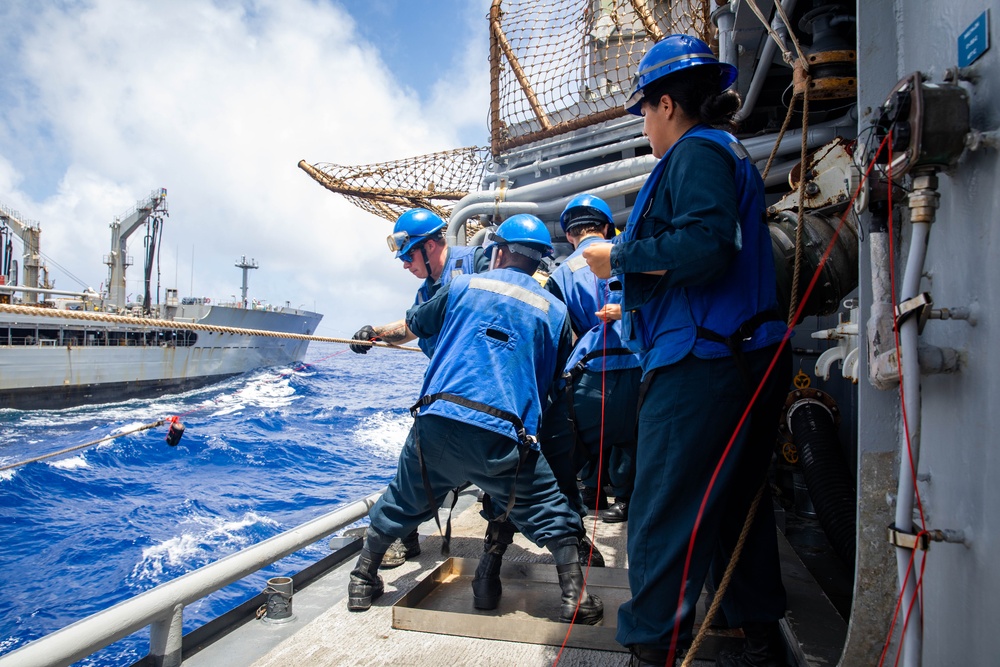 USS Robert Smalls (CG 62) Boatswains's Mates Heave Line during RAS