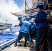 USS Robert Smalls (CG 62) Boatswains's Mates Heave Line during RAS