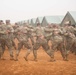 145th Field Artillery Soldiers dance in the Moroccan rain