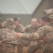 145th Field Artillery Soldiers dance in the Moroccan rain