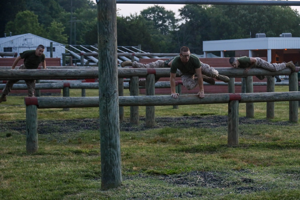 OCS Candidates Conduct the Obstacle Course