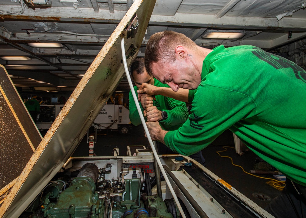 Sailors Conduct Maintenance