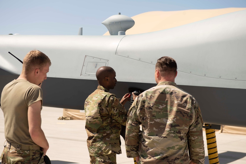 Prepping the MQ-9 Reaper for flight; So it can soar in its first iteration of an ACE exercise.