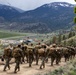 Marines with 2/23 conduct a conditioning hike during MTX 4-23