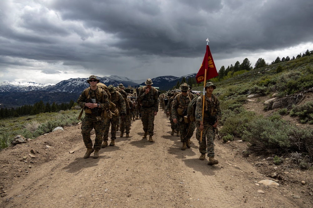 Marines with 2/23 conduct a conditioning hike during MTX 4-23