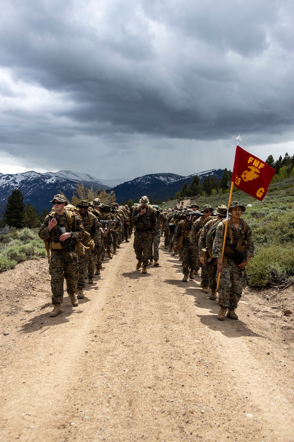 Marines with 2/23 conduct a conditioning hike during MTX 4-23