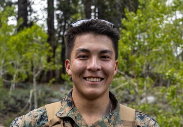Marines with 2/23 conduct a conditioning hike during MTX 4-23