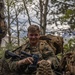 Marines with 2/23 conduct a conditioning hike during MTX 4-23