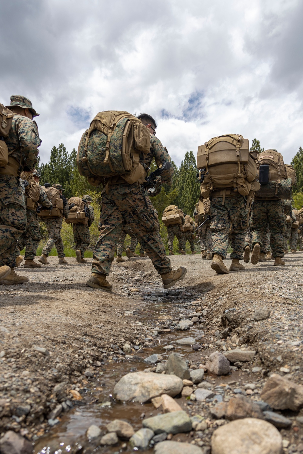 Marines with 2/23 conduct a conditioning hike during MTX 4-23