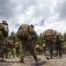 Marines with 2/23 conduct a conditioning hike during MTX 4-23