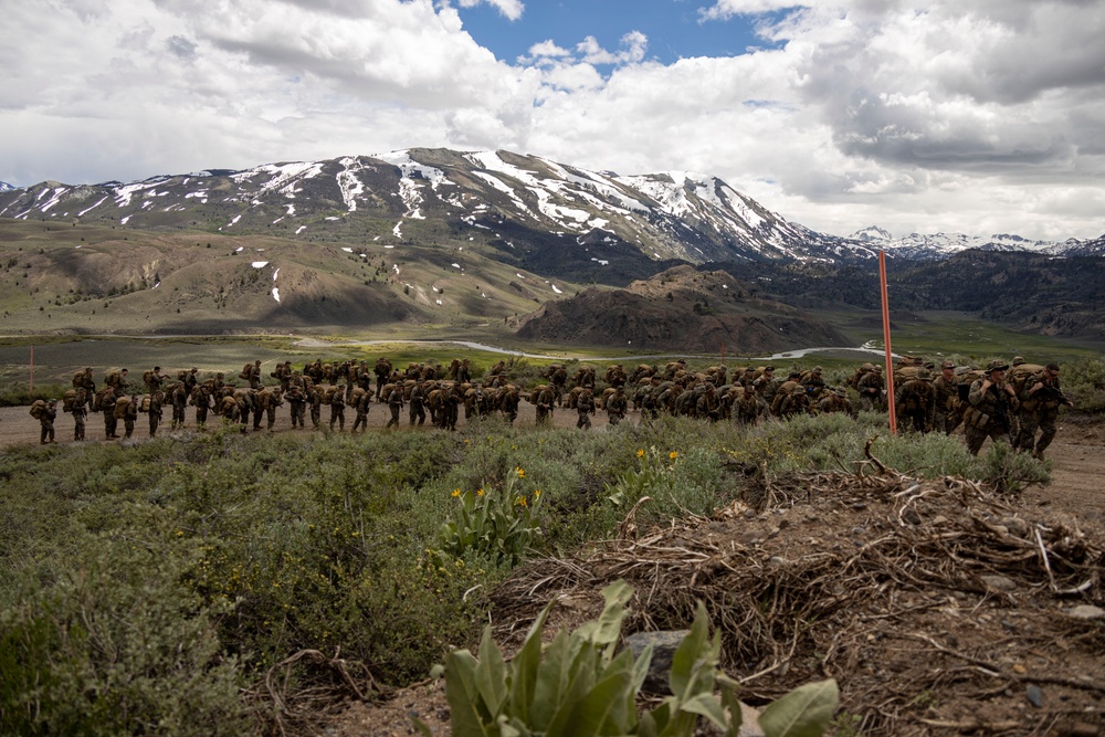 Marines with 2/23 conduct a conditioning hike during MTX 4-23