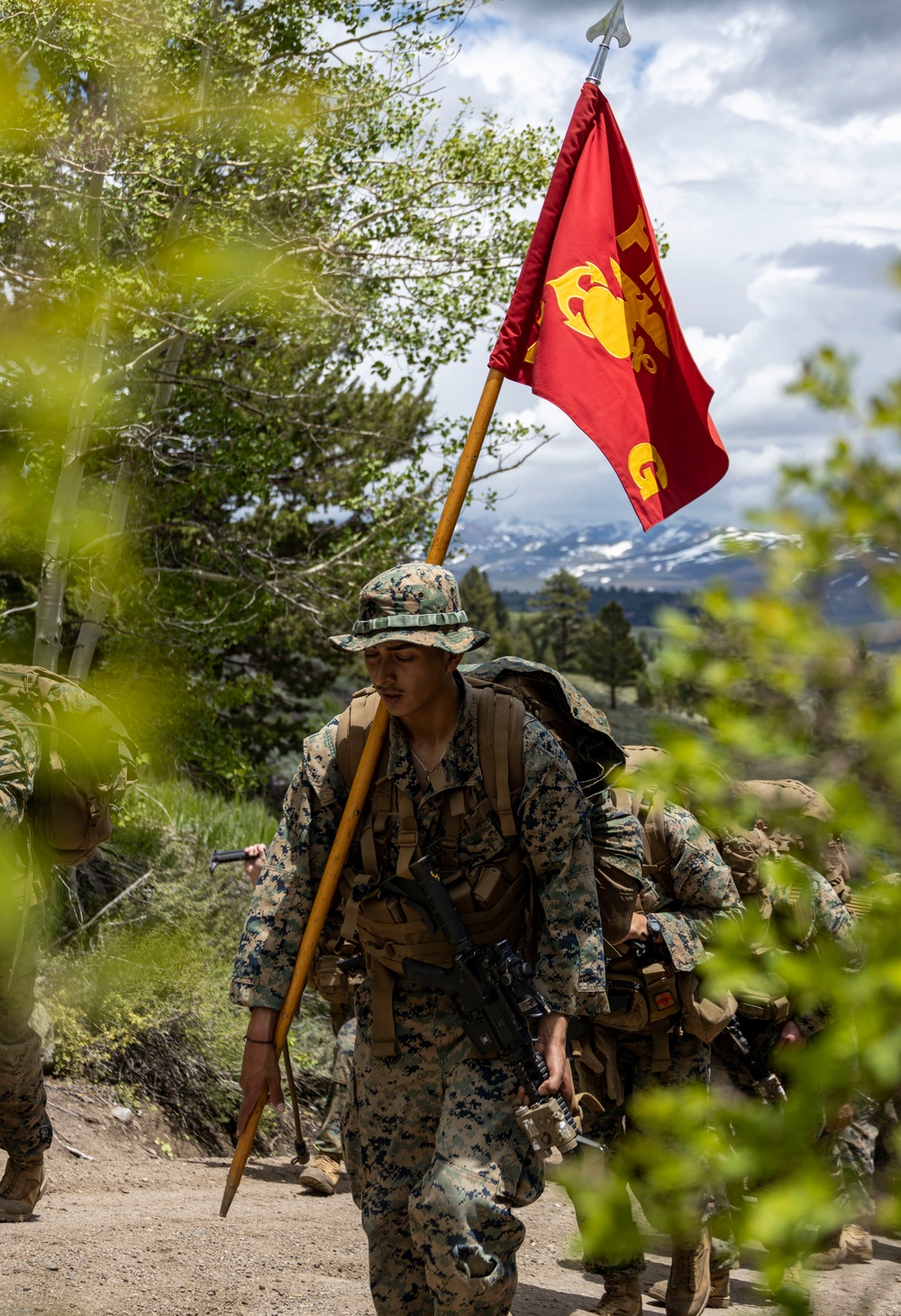 Marines with 2/23 conduct a conditioning hike during MTX 4-23