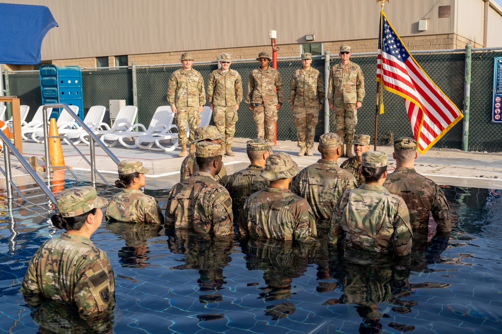 Promotion ceremony in a swimming pool