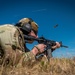 Air Force Reserve Maj. James Fink fires M4 rifle