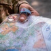 Army Reserve Capt. Steven Tirado checks his map