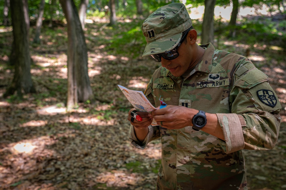 Army Reserve Capt. Kevin Tirado checks his map