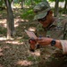 Army Reserve Capt. Kevin Tirado checks his map