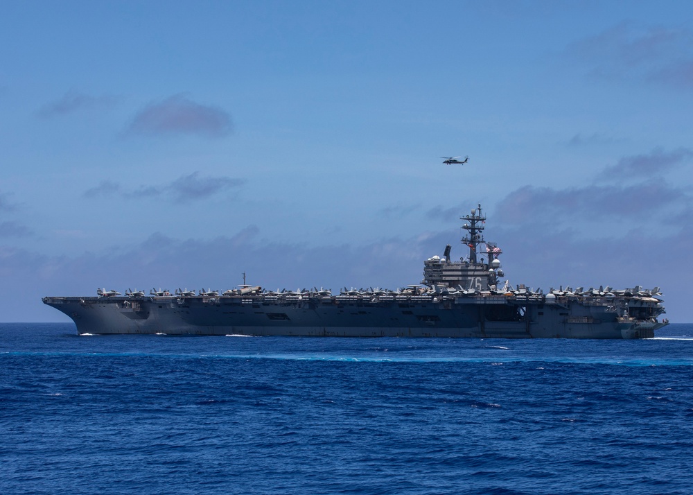 USS Rafael Peralta (DDG 115) participates in a multiple large deck event