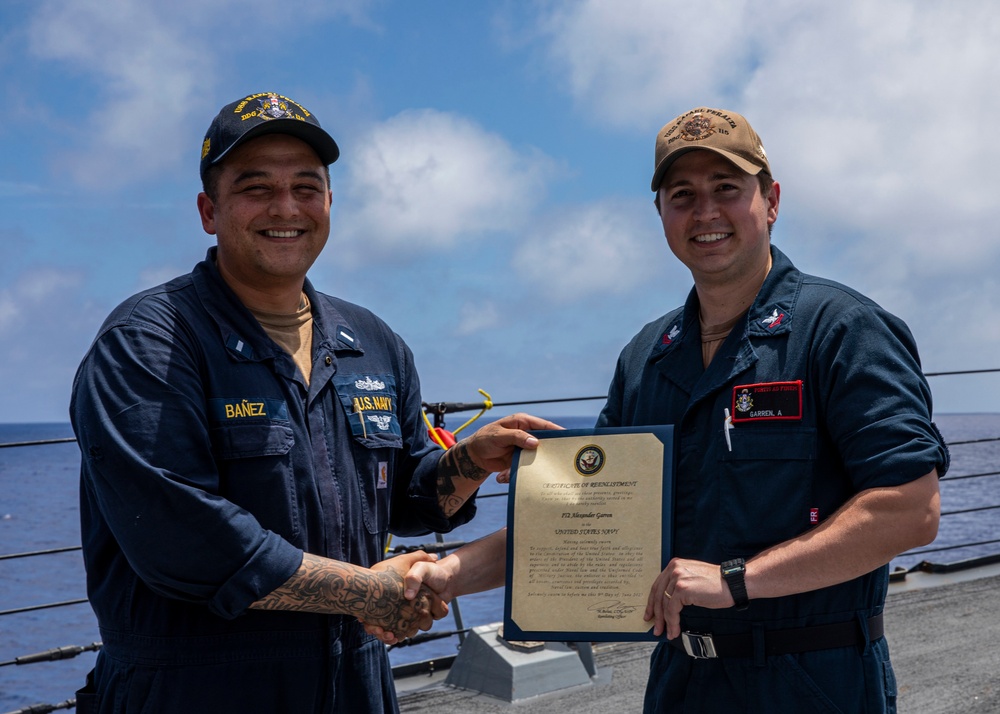 USS Rafael Peralta (DDG 115) conducts a reenlistment on the forecastle