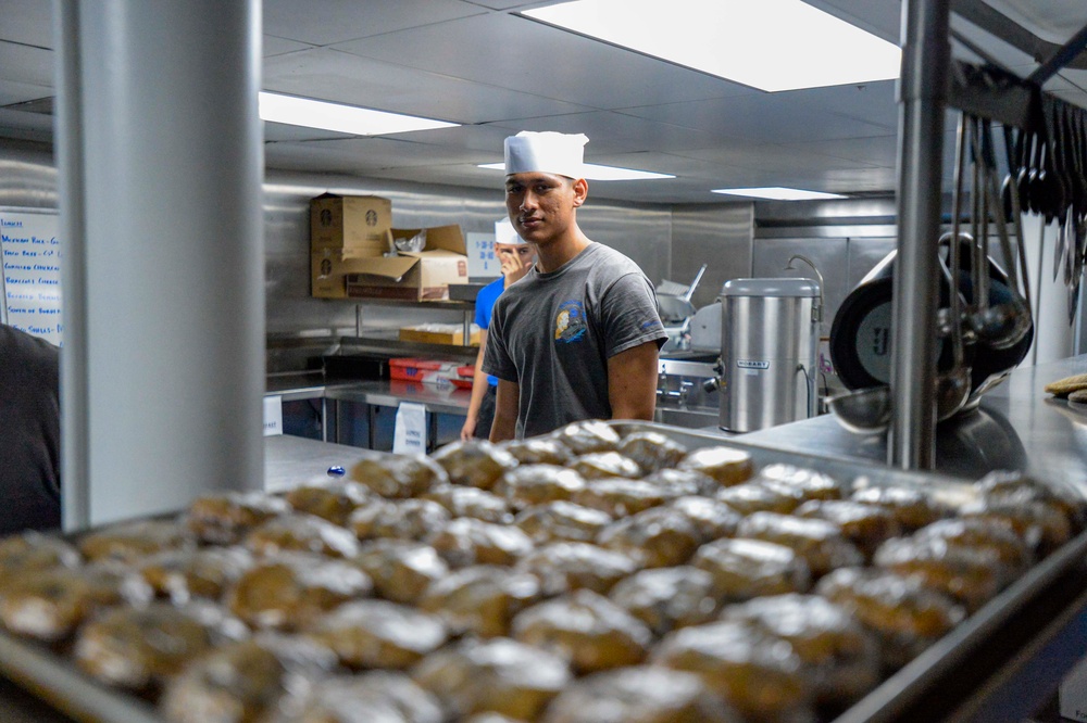 Abraham Lincoln Sailors cook food