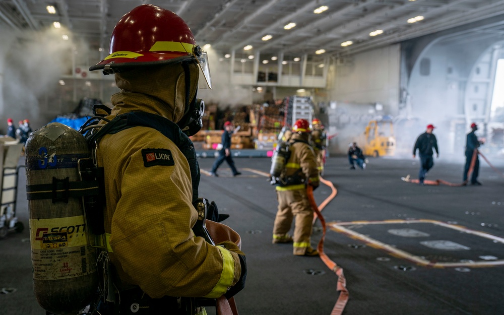 Sailors participate in General Quarters aboard USS Carl Vinson (CVN 70)