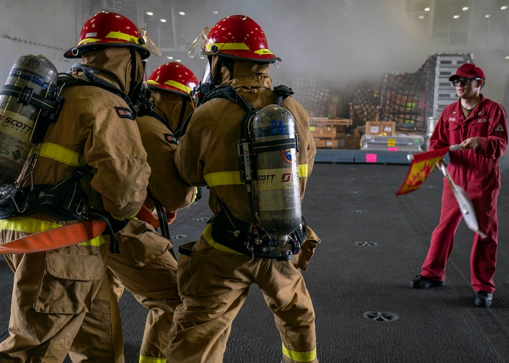 Sailors participate in General Quarters aboard USS Carl Vinson (CVN 70)